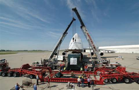 It was a matter of tons and inches for this high profile haul, lift, rotate, load and transport proj