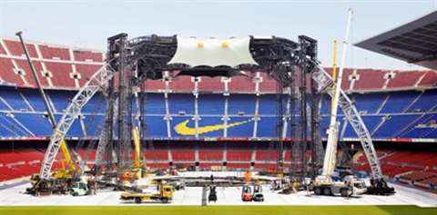 Assembling a U2 band tour stage.