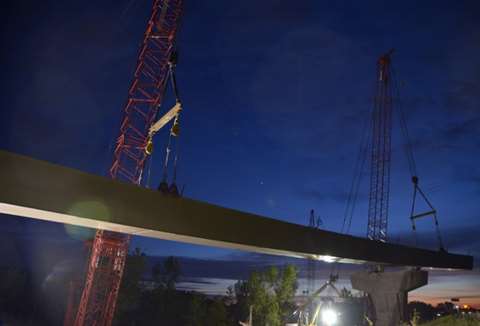 Four Manitowoc 2250 crawler cranes assembled overpass bridges in Wisconsin.