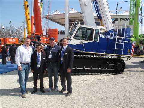 Empire Crane inks a deal to purchase two Mantis telecrawlers. Pictured from left are Paul Lonergan, 