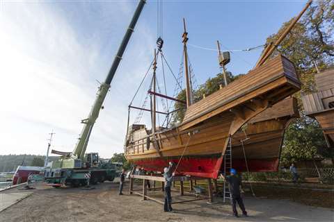 One of the boats is placed on a metal construction for the winter.