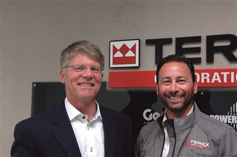 John Garrison, Terex Corporation president and CEO, left, and Steve Filipov, Terex Cranes president