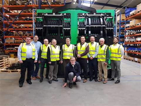 De Haan's new US representatives standing in front of a 1,000 tonne hook block at the Dutch factory