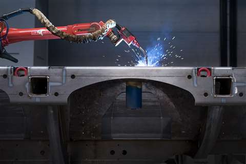 Automatic welding robot sparking torch on side plate of a trailer