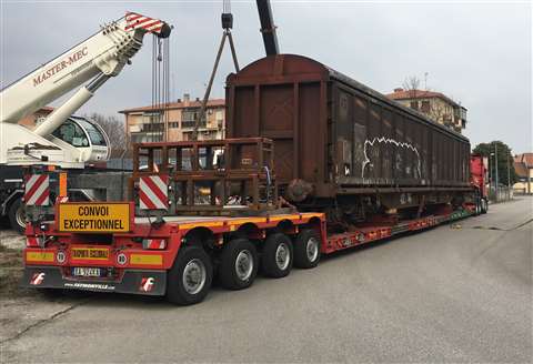 Facchin Trasporti used a yello Faymonville MegaMax extending low bed trailer telescoped out to carry a rail wagon by road