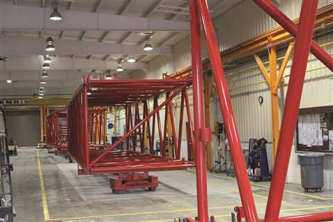 Boom section assembly building