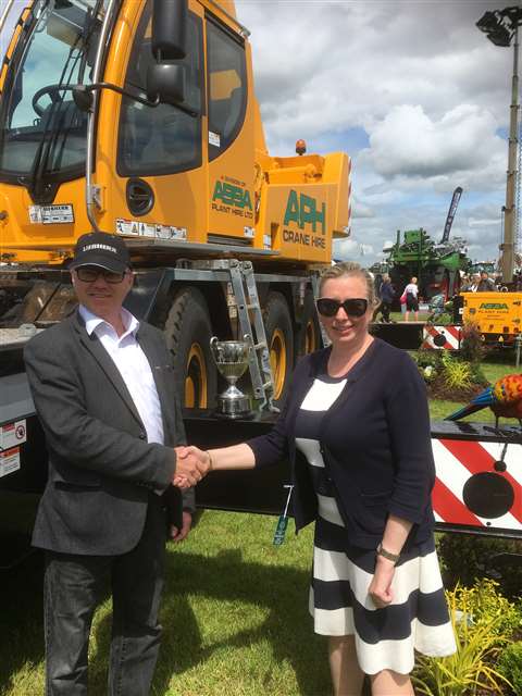 Steve Elliott from Liebherr and Tracy Bourne from Abba Plant Hire at the official handover of Abba Plant’s new Liebherr LTC1050-3.1 at the Lincolnshire Show