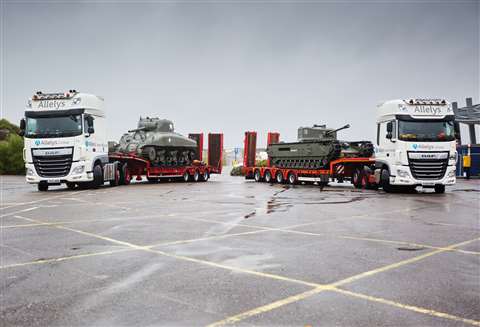 A Churchill tank and Sherman tank were moved in and lifted onto the landing craft